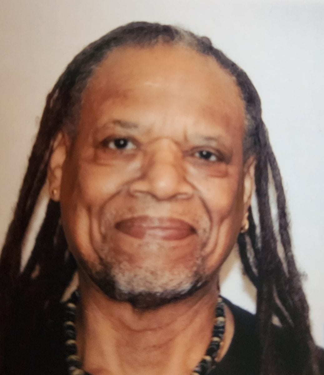 Close-crop photo of Alan smiling