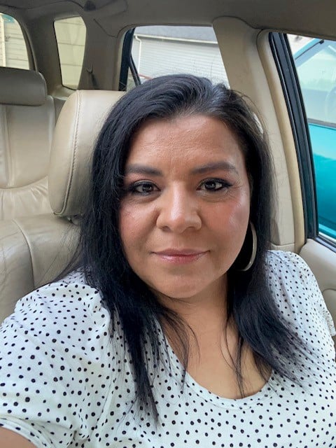 Portrait of Maria taken in front seat of car