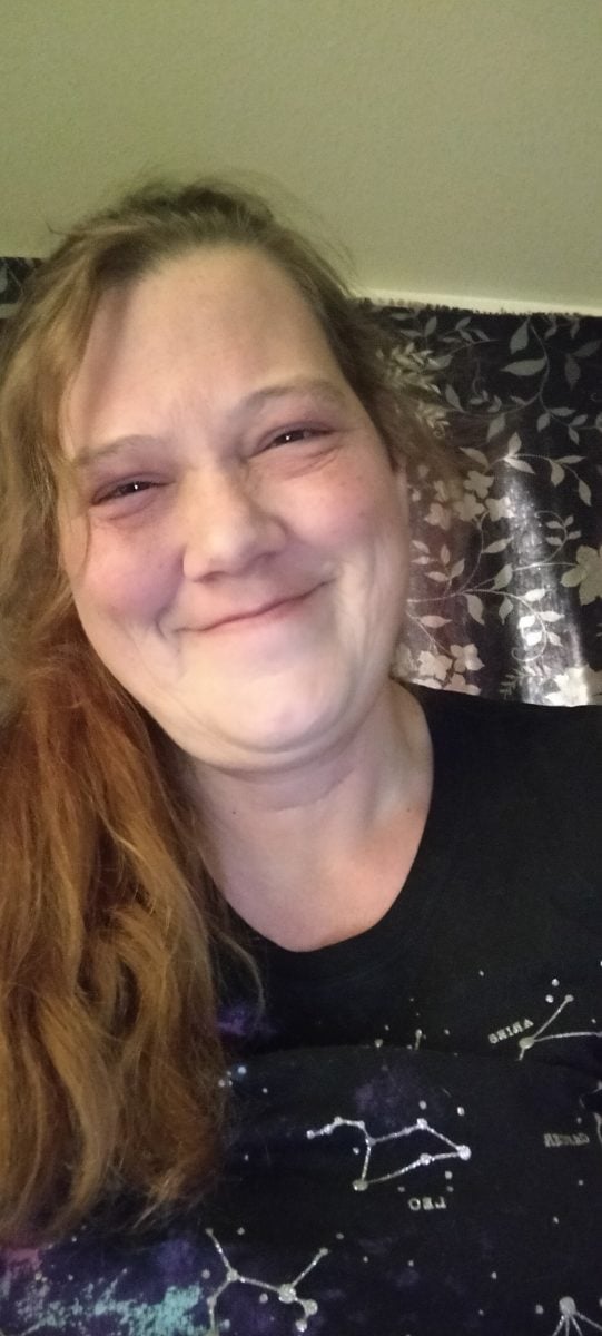Roberta with a beaming warm smile
